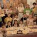 Moșii de toamnă: Copiii românilor din Italia învață la biserică să prepare colivă și colaci