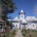 Dublă bucurie duhovnicească în Parohia Victoria, ctitoria patriarhului Teoctist: Botezul celui de-al treilea copil al preotului paroh și sfinţirea casei parohiale