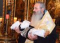 Dublă bucurie duhovnicească în Parohia Tudor Vladimirescu: Sfânta Liturghie Arhierească și botezul celui de-al treilea copil al preotului paroh