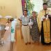 Botez plin de emoție în Austria: Părintele Vasile Melinte și preoteasa Ana Maria l-au creștinat pe micuțul Cristian-Iosif